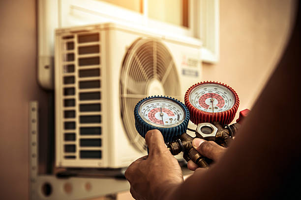 Professional Hvac technician working in Piedmont, AL